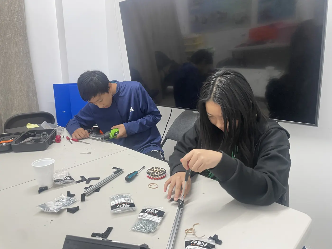 Building with REV parts and tools at the workbench